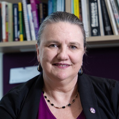 MJG at Desk 1 Cropped S,